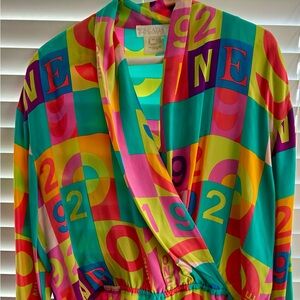 Escada silk print bodysuit with crossover front. Size 42